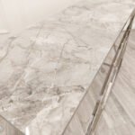 stella chrome console table with stomach ash grey sintered top